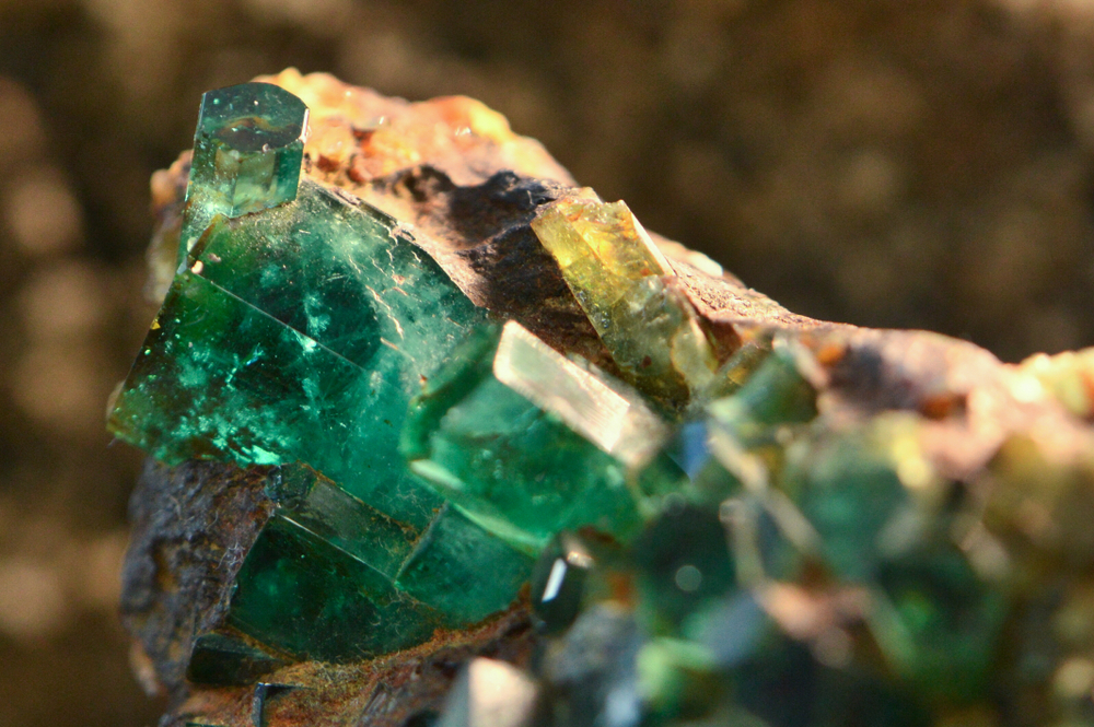 raw green emerald crystal